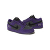 Purple and black sneakers with '94' logo on a white background