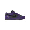 Purple sneaker with black accents on a white background